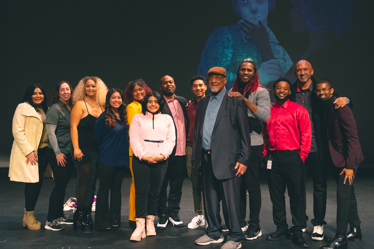 Social Equity Commission members pose with student performers at Justice Sunday