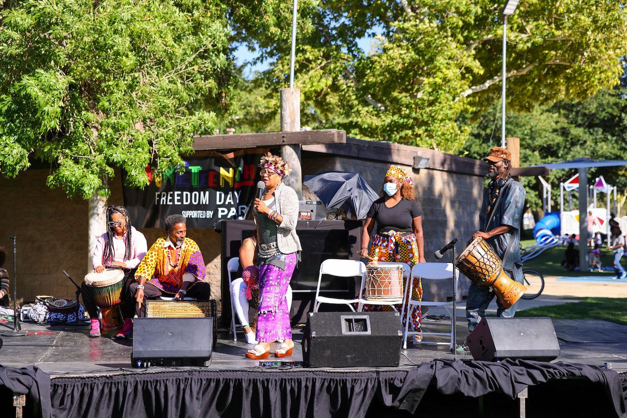 Musicians on stage at Sgt. Steve Owen Memorial Park at the 2022 Lancaster Juneteenth Celebration