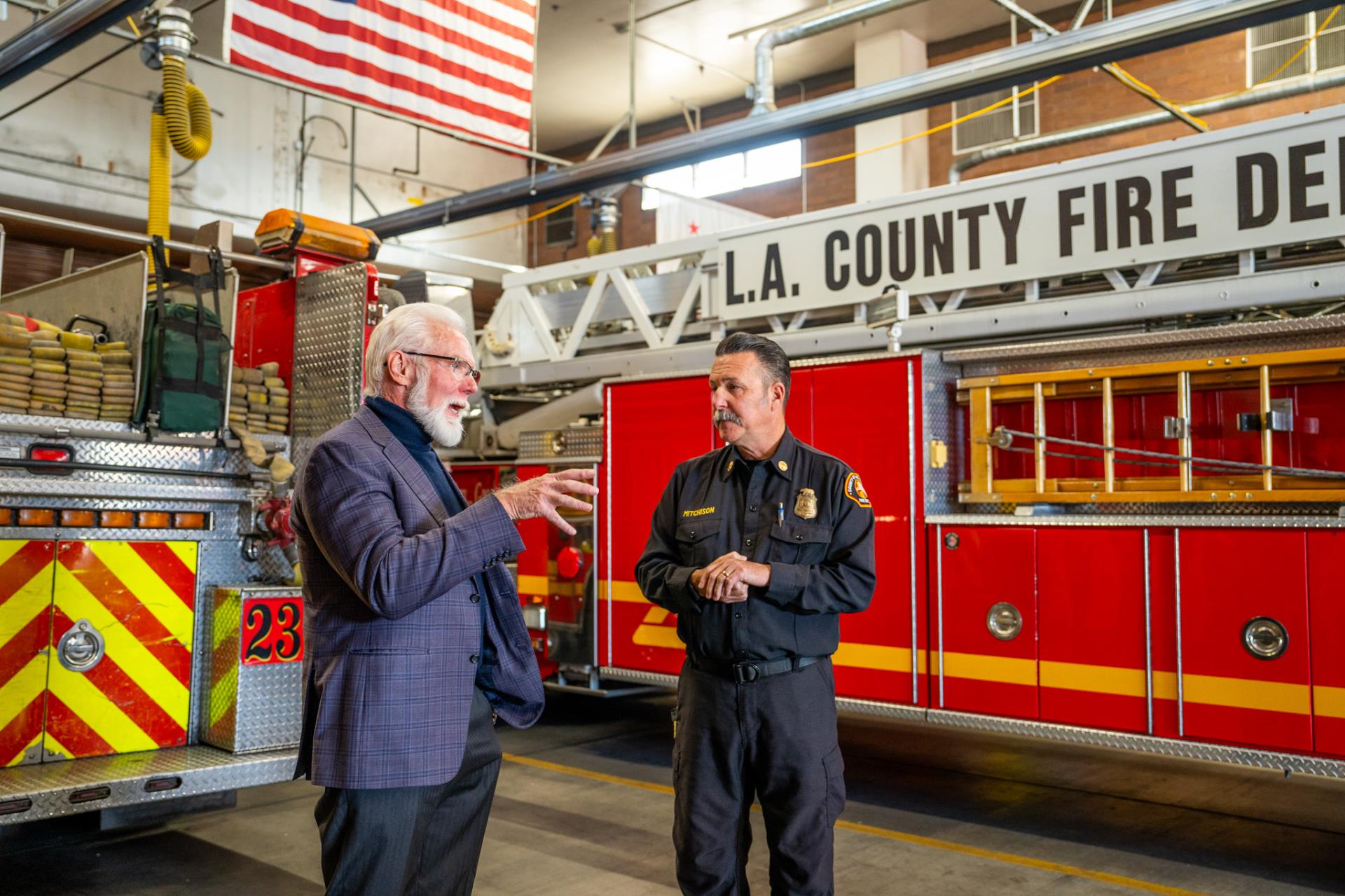 Mayor Parris talks with Fire Station 33 Chief in front of fire truck