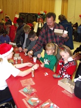 Families participating in Christmas activities.